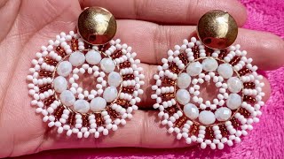 Aretes tejidos sobre aro ✨ tutorial facil de bisutería artesanal aretes en mostacilla y murano [upl. by Mathi730]