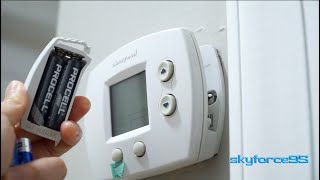 How to Replace the Batteries in a Honeywell Thermostat [upl. by Garin69]