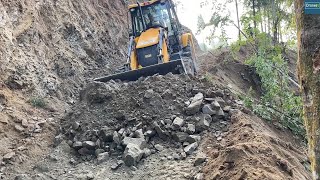 Leveling Freshly Cut Gravelly Mountain Narrow Road Bed with JCB Backhoe Loader [upl. by Htrowslle689]