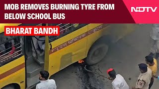 Bharat Bandh In Bihar Mob Removes Burning Tyre From Below School Bus [upl. by Ayor]