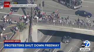 ProPalestinian protesters block one side of 101 Freeway near DTLA [upl. by Yonatan832]