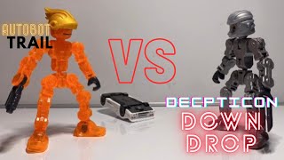 Autobot Trail VS Decpticon Downdrop transformers klikbot [upl. by Amadus]