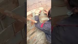 Masonry process of white bricks on the well wall [upl. by Niuqauj]