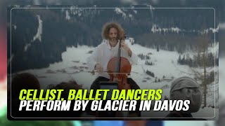 Cellist ballet dancers perform by glacier in Davos to spark climate hope  ABSCBN News [upl. by Ane99]