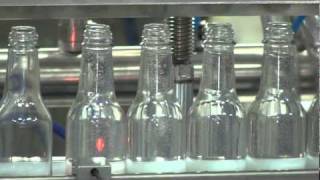 Pressure Overflow filler working with Glass Bottles by Acasi Machinery [upl. by Ky]