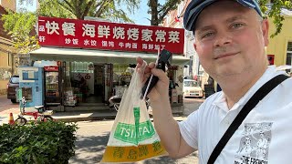 Drinking beer from a goldfish bag in Qingdao China 青岛 中国 啤酒 [upl. by Asilana]