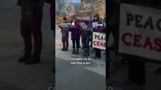 Carolers in Minneapolis sing Christmas songs calling for ceasefire in Gaza [upl. by Aenal]