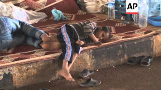 Civilians displaced by war take refuge in warehouses near Turkish border [upl. by Darda522]