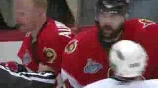 Daniel Alfredsson shoots the puck on Niedermayer [upl. by Gahl]