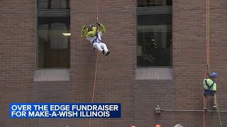 Southpaw joins dozens in repelling off Hyatt Regency in Chicagos Loop for MakeaWish [upl. by Scibert]