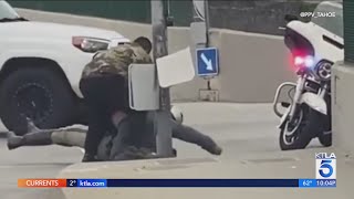 Video captures Good Samaritans rescuing CHP officer under attack in Orange County [upl. by Ahsuat883]