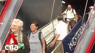 Last passengers leave Cambodia cruise ship after being cleared of COVID19 [upl. by Nary758]