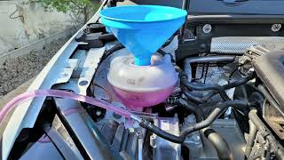 Golf 75 Renewal of engine coolant G13 to G12EVO Change of expansion tank [upl. by Mureil819]