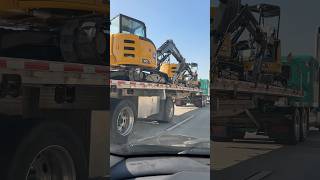 HAULING JOHN DEERE EXCAVATORS trucking construction shorts [upl. by Nehte]