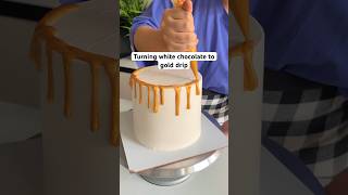 Turn white chocolate into gold drip😍🙈 cakehacks goldcake cakedecoration whipcream [upl. by Kcered]