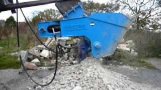 Concrete Crusher Making short work of concrete blocks into aggregate [upl. by Ennairol47]