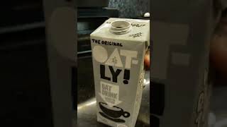 Lets make oatly milk barista edition caffe latte oats oatly oatlymilk shorts [upl. by Lippold542]