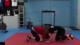 Front Headlock Technique  Beginner Womens MMA Wrestling Moves presented by Self Defined Fitness [upl. by Ciaphus]