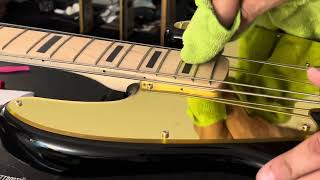 Putting inlay stickers on a Fender Squier Bass guitar ￼ [upl. by Wrigley798]