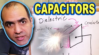 How CAPACITORS Work ElectroBOOM101006 [upl. by Carlick]