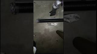 Garage door Spring broken garagedoorrepair torsionspring house [upl. by Enirod]