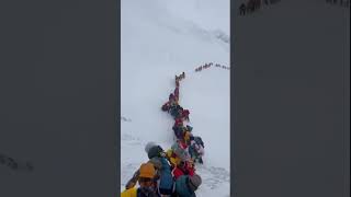 Mount Everest traffic jam as hundreds of climbers wait to summit during weather window [upl. by Mintz]