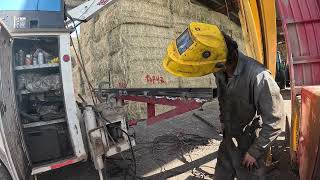 Welding a load rack on a1095 New Holland [upl. by Ahseinod]