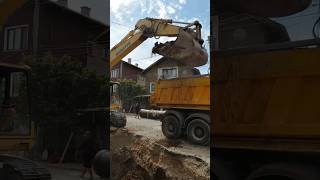 Excavator loading dump truck [upl. by Nolyaj]