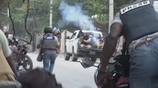 Agents killed in the third day of protests demanding the ousting of Haitian Prime Minister [upl. by Akili]