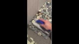 Installing Flat Stone Pebble On A Shower Floor [upl. by Bartholemy53]