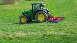 Wiese striegeln mit JohnDeere 6910 und Hatzenbichler Striegel [upl. by Attecnoc]