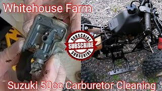 Suzuki 50cc ATV Carburetor Cleaning [upl. by Eneri824]