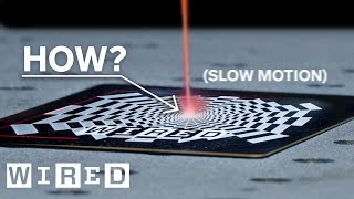 How Do Laser Beams Engrave Things slow motion  WIRED [upl. by Anegal475]