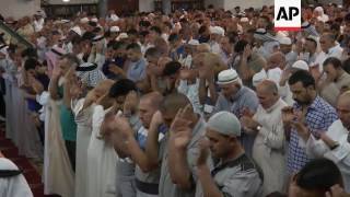 Muslims join Eid prayers in Baghdad mosque [upl. by Lexis350]