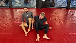 BJJ technique  Coach Zahabi and GSP show you one of their favorite moves from back control [upl. by Odnama]