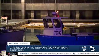 Crews work to remove sunken boat at Shelter Island Boat Launch [upl. by Llehcal]