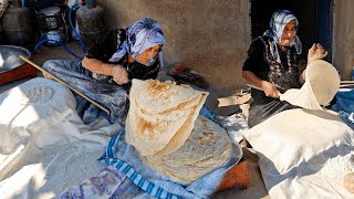 Making local bread in a traditional style in a desert village by a grandmother [upl. by Pavia]