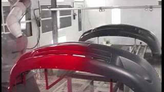 Motoman PX2900 robot painting automotive plastic bumpers [upl. by Isewk739]