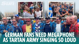 German fans need a megaphone as they are drowned out by Tartan Army singing [upl. by Mcnally]