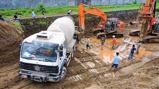 Ready MIX Cement Concrete Truck Slip And Stuck Recovery By Excavator [upl. by Ahseekan]