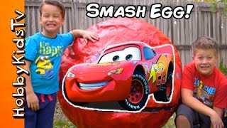 World’s Biggest Lightning McQueen SMASH EGG Surprise by HobbyKidsTV [upl. by Katzir240]