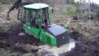 John Deere 1110E stuck deep in mud saving with homemade forwarder extra fotage [upl. by Eylk]