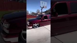 Bagged Chevy Silverado Crewcab Cateye Tucking 24” Rims Red Candy Paint silverado baggedtrucks [upl. by Enilrac]