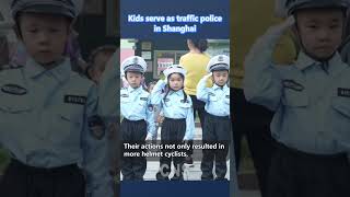 Kids serve as traffic police in China’s Shanghai [upl. by Atileda]