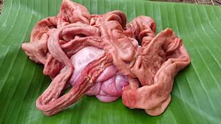 Primitive Technology cooking pigs intestine in the clay  cooking pigs intestine delicious [upl. by Drusy605]