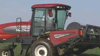 MacDon M150 SP Windrower Tractor Driveby in reverse [upl. by Waters]