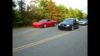 VW Golf R32 Vs Ferrari Modena 360 [upl. by Ayhtin]