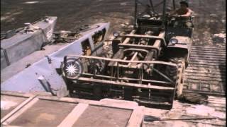 A fork lift unloads crates from US Navy landing craft LCM8 at ramp and operator HD Stock Footage [upl. by Carmen]