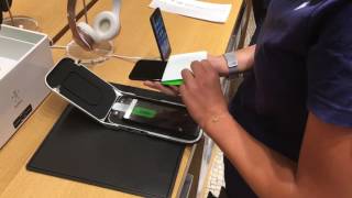 An apple specialist installing screen protector to a new iPhone 7 [upl. by Vivl]