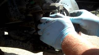 2007 Nissan Frontier Front Brakes Part 2 [upl. by Dari]